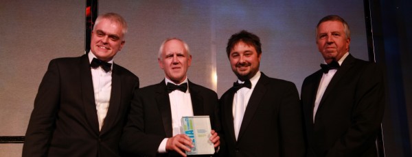 IVS directors Paul Pike and Steve Jenner collecting the award for Team IVS